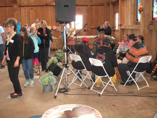 Drummers and singers provide pie walk music